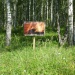 Плакат на дороге напротив истока Урала